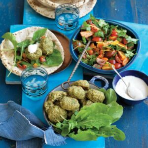 Baked falafels with tahini yoghurt and tomato salad