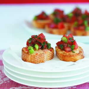 Bruschetta with chickpea spread and basil tomatoes