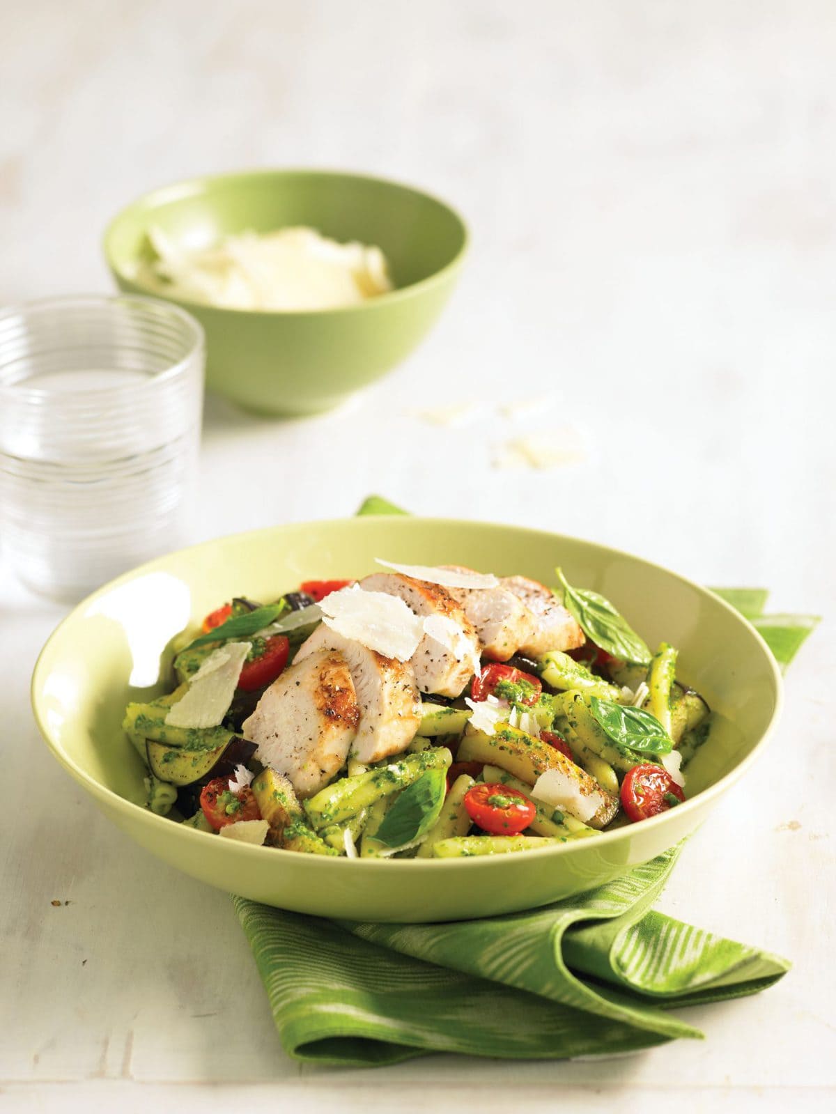 Chicken pesto pasta with tomatoes and eggplant