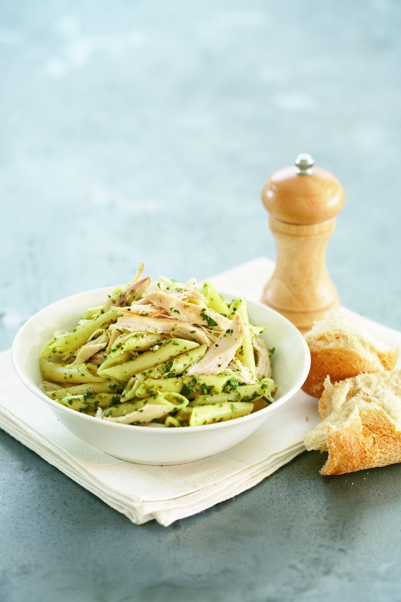 Chicken pasta with basil, parsley and caper sauce