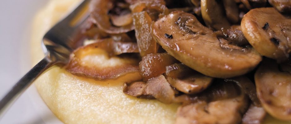 Creamy polenta with caramelised onions and mushrooms