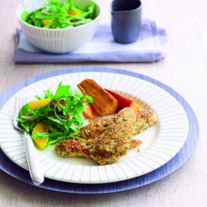 Crumbed chicken with rocket salad and wedges