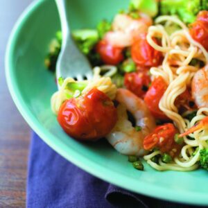 Garlic prawns with broccoli and squashed tomatoes