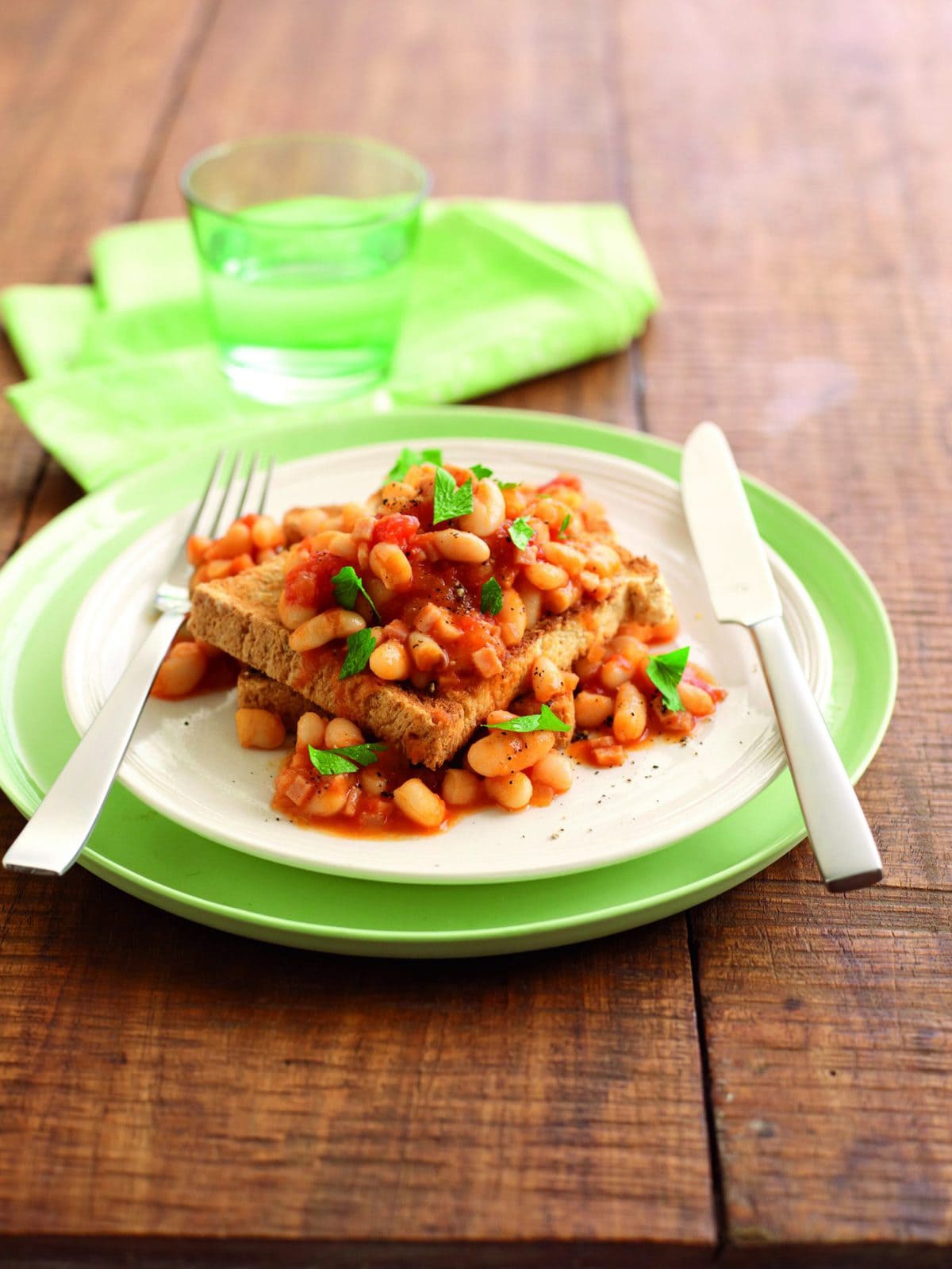 Homemade baked beans and ham on toast