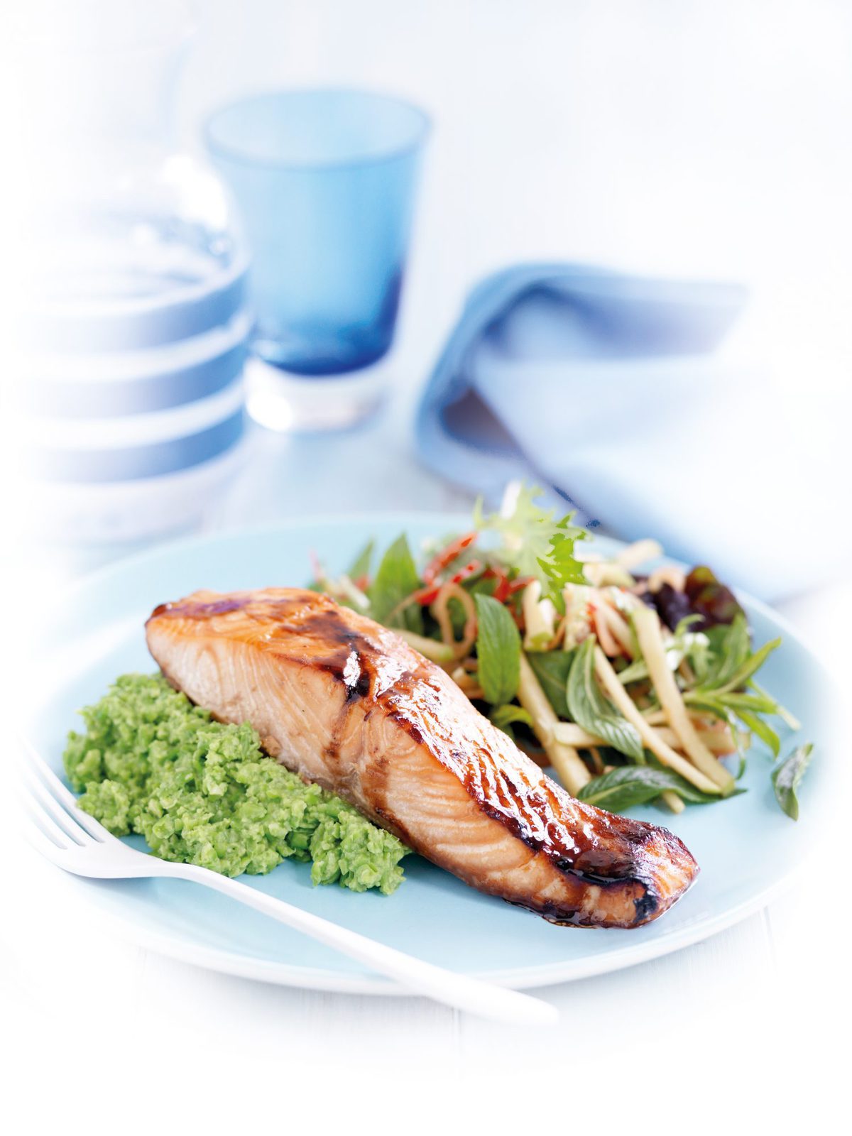 Honey-spiced salmon with wasabi pea mash and apple salad