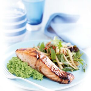 Honey-spiced salmon with wasabi pea mash and apple salad