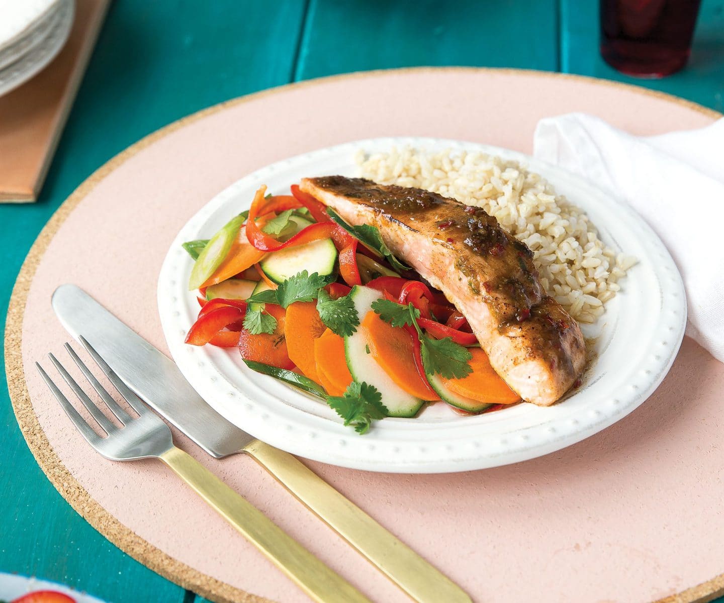 Jerk glazed salmon with Caribbean courgette slaw and brown rice