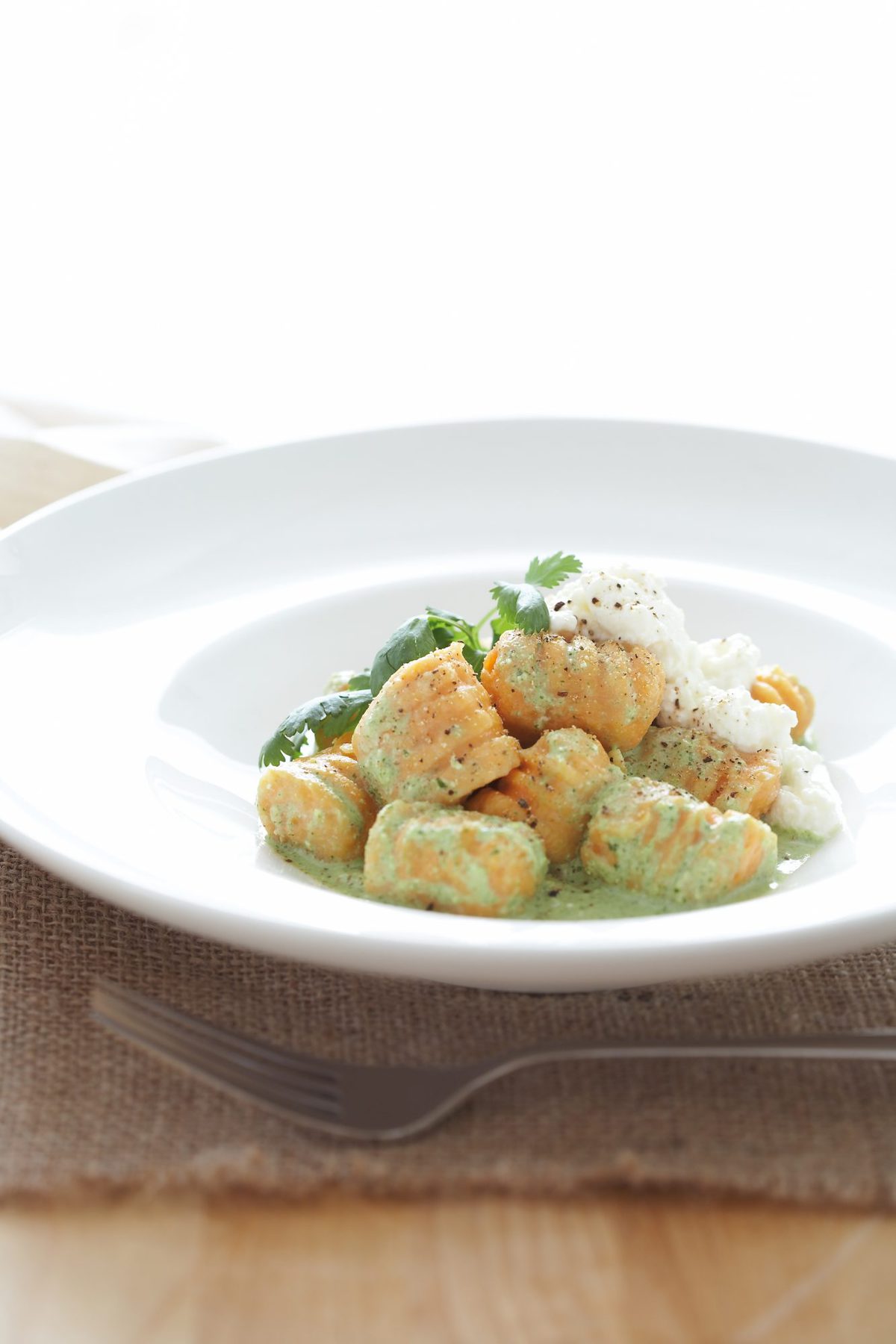 Kumara gnocchi with coriander sauce
