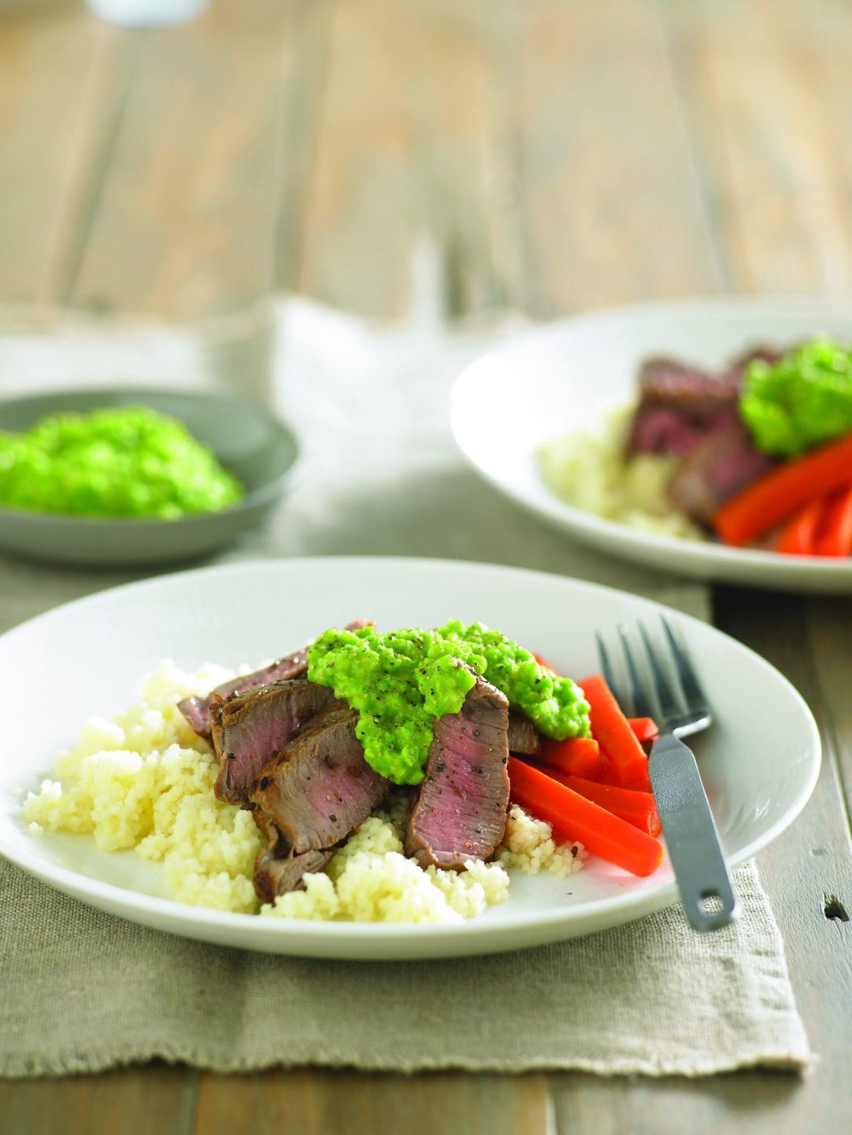 Lamb steak with pea hummus