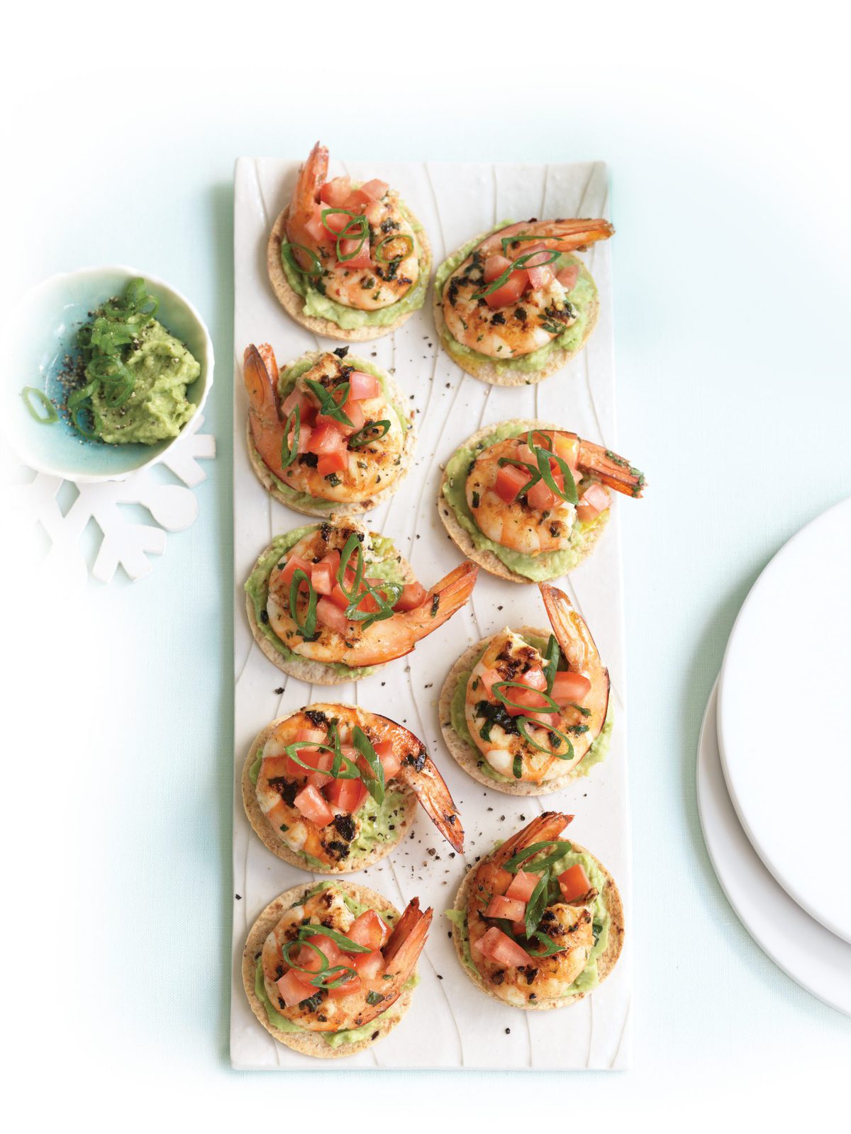 Mini prawn tortillas with smashed avocado and salsa