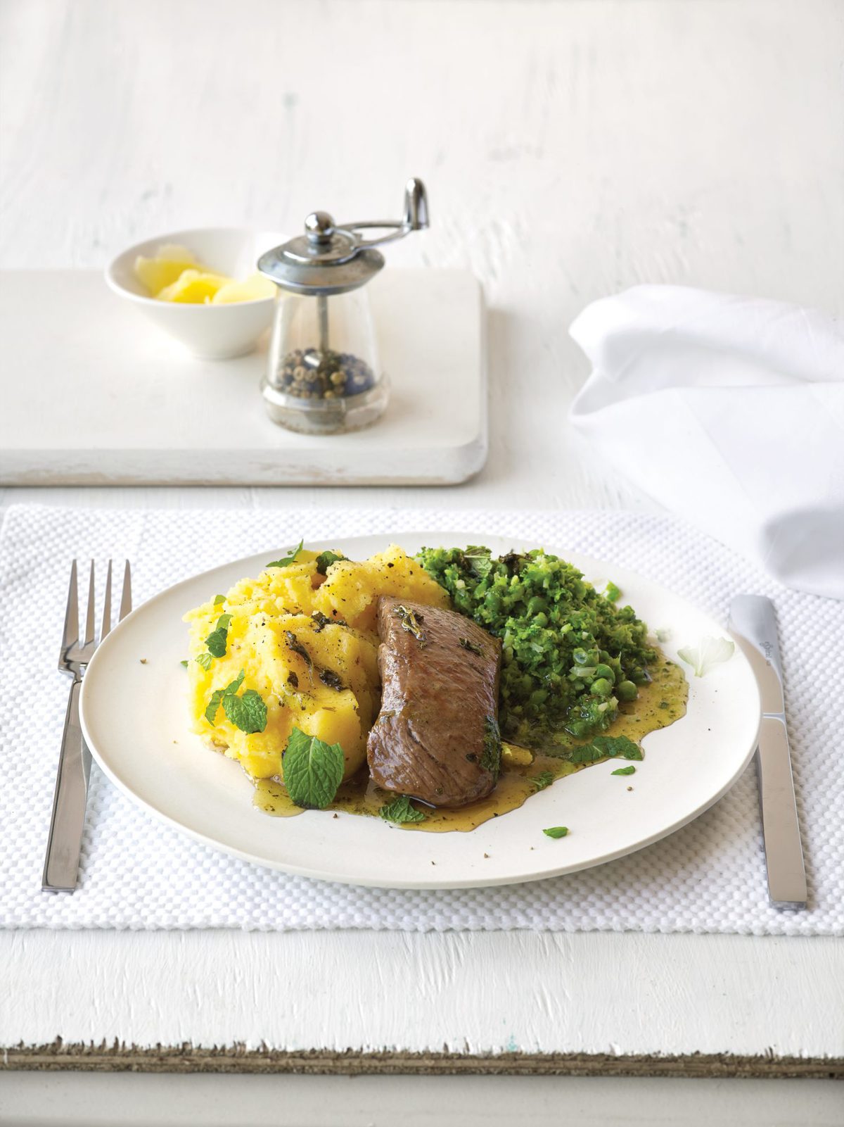 Mint-glazed lamb with soft polenta and green vege mash