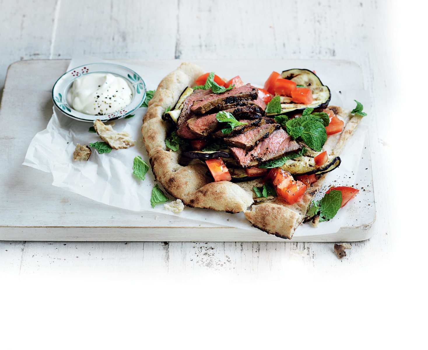 Moroccan-spiced steak with eggplant and tomato salad