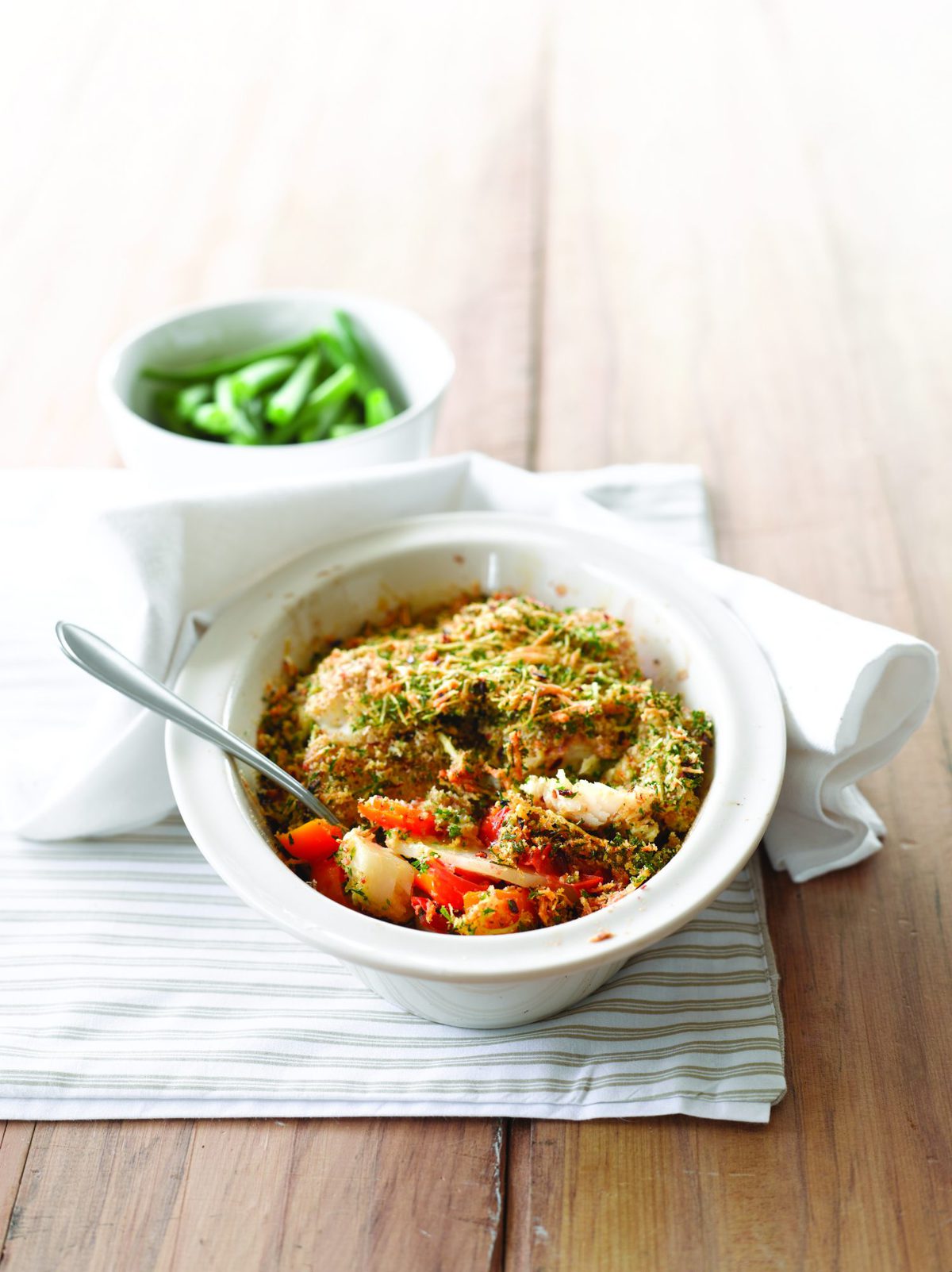 One-dish fish bake with potatoes and peppers