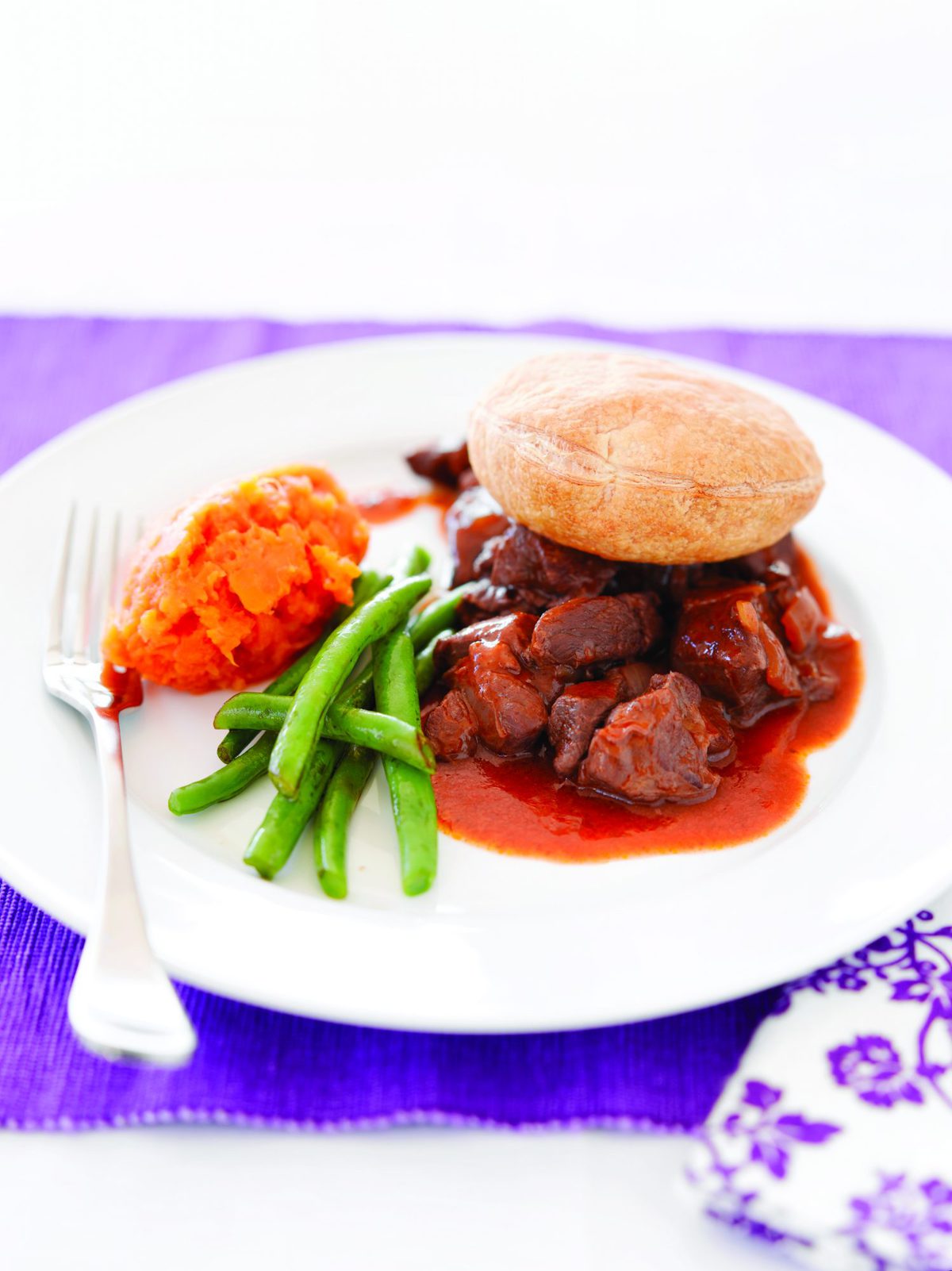 Open red wine beef pie, roasted garlic mash and balsamic beans