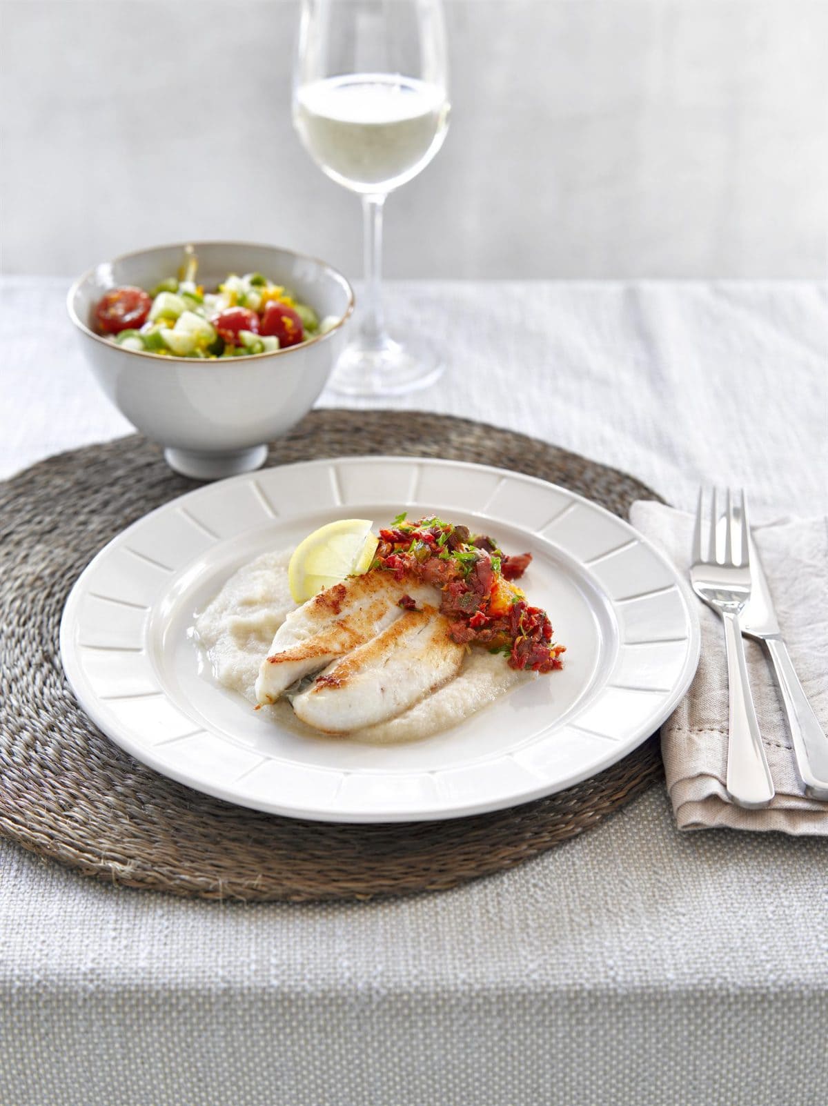 Pan-fried fish with cauliflower puree and citrus caper salsa