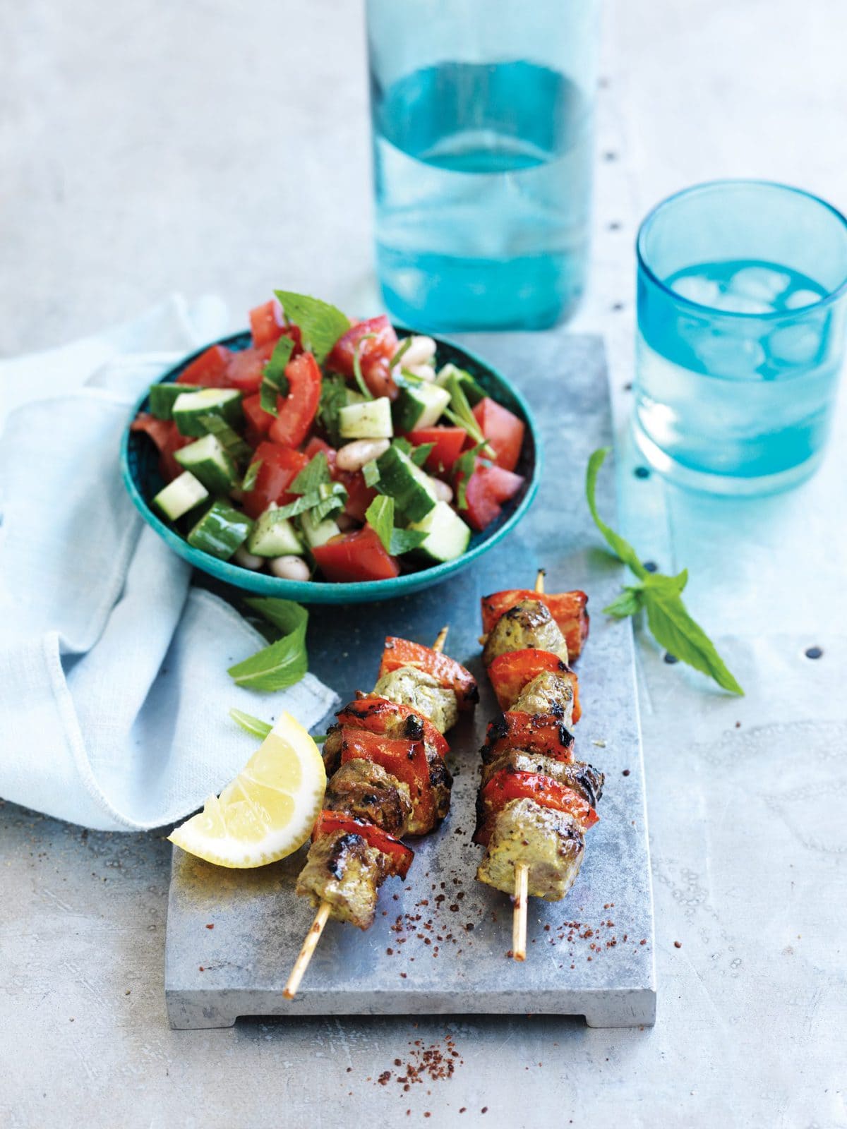 Persian beef skewers with chopped tomato and mint salad