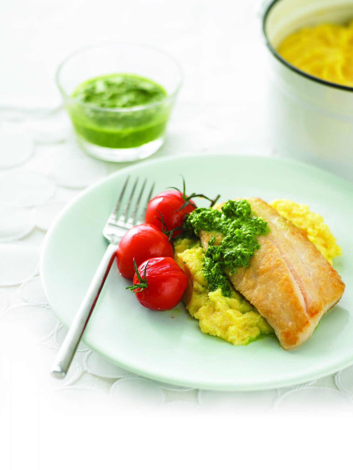 Pesto fish fillets with creamy polenta