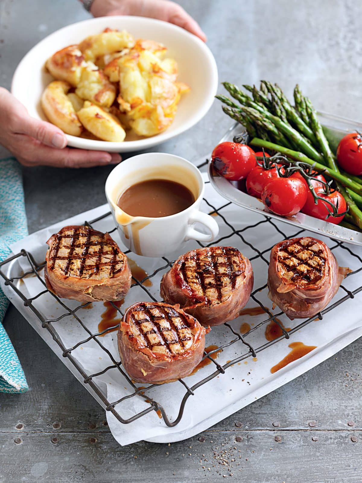 Prosciutto-wrapped mustard beef with crushed potatoes