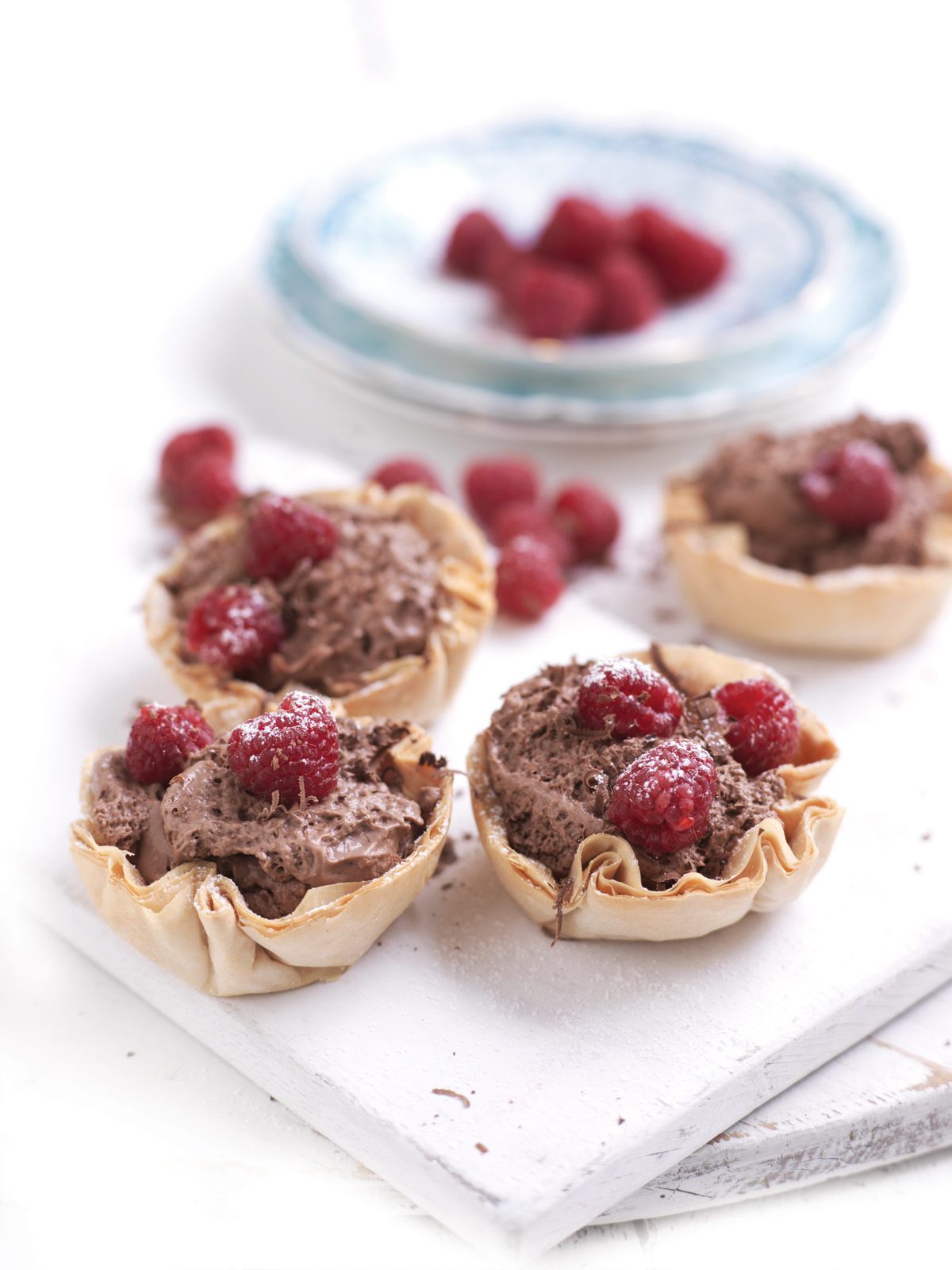 Raspberry and chocolate filo tarts