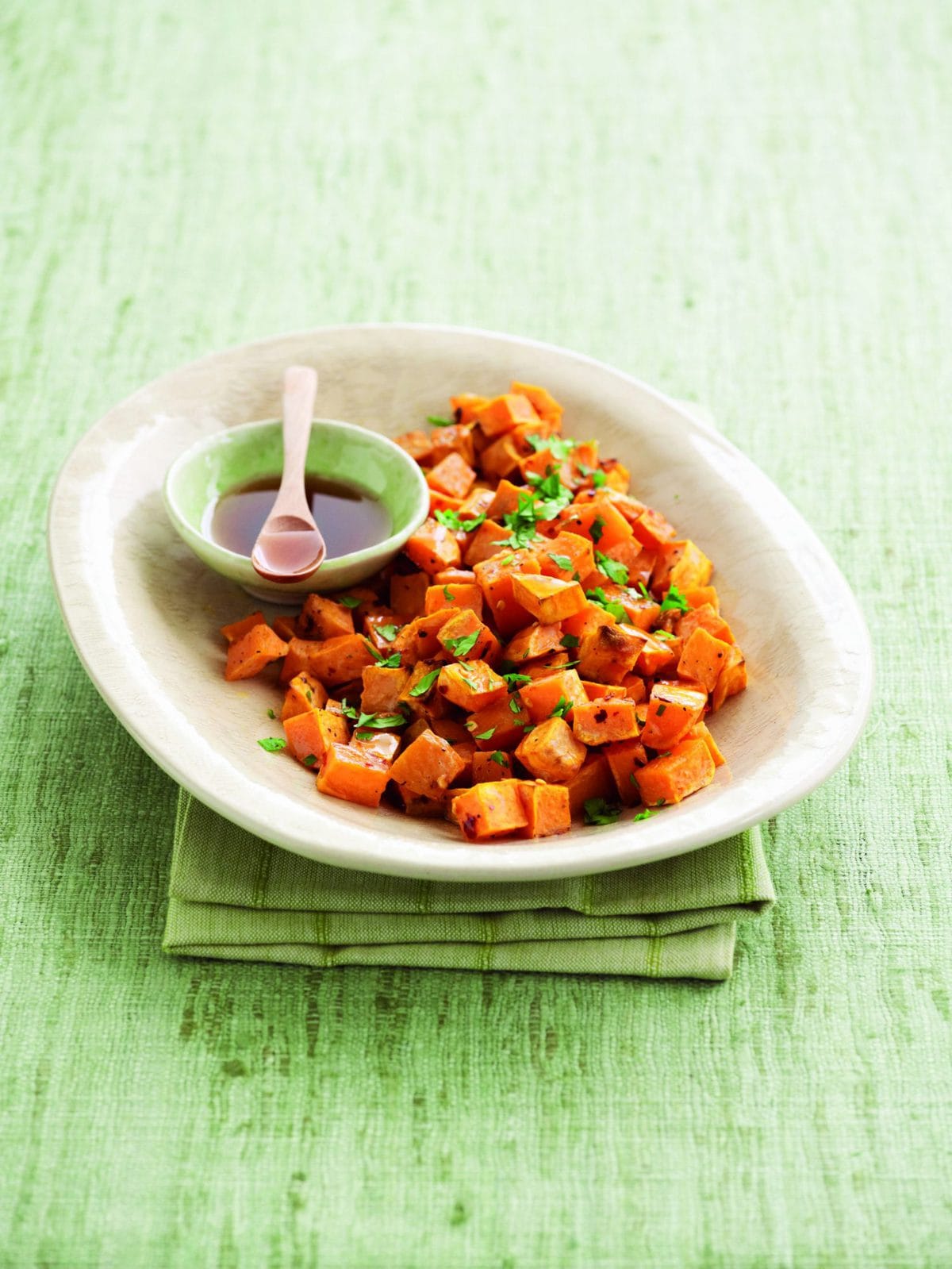 Roasted golden kumara with spicy honey dressing