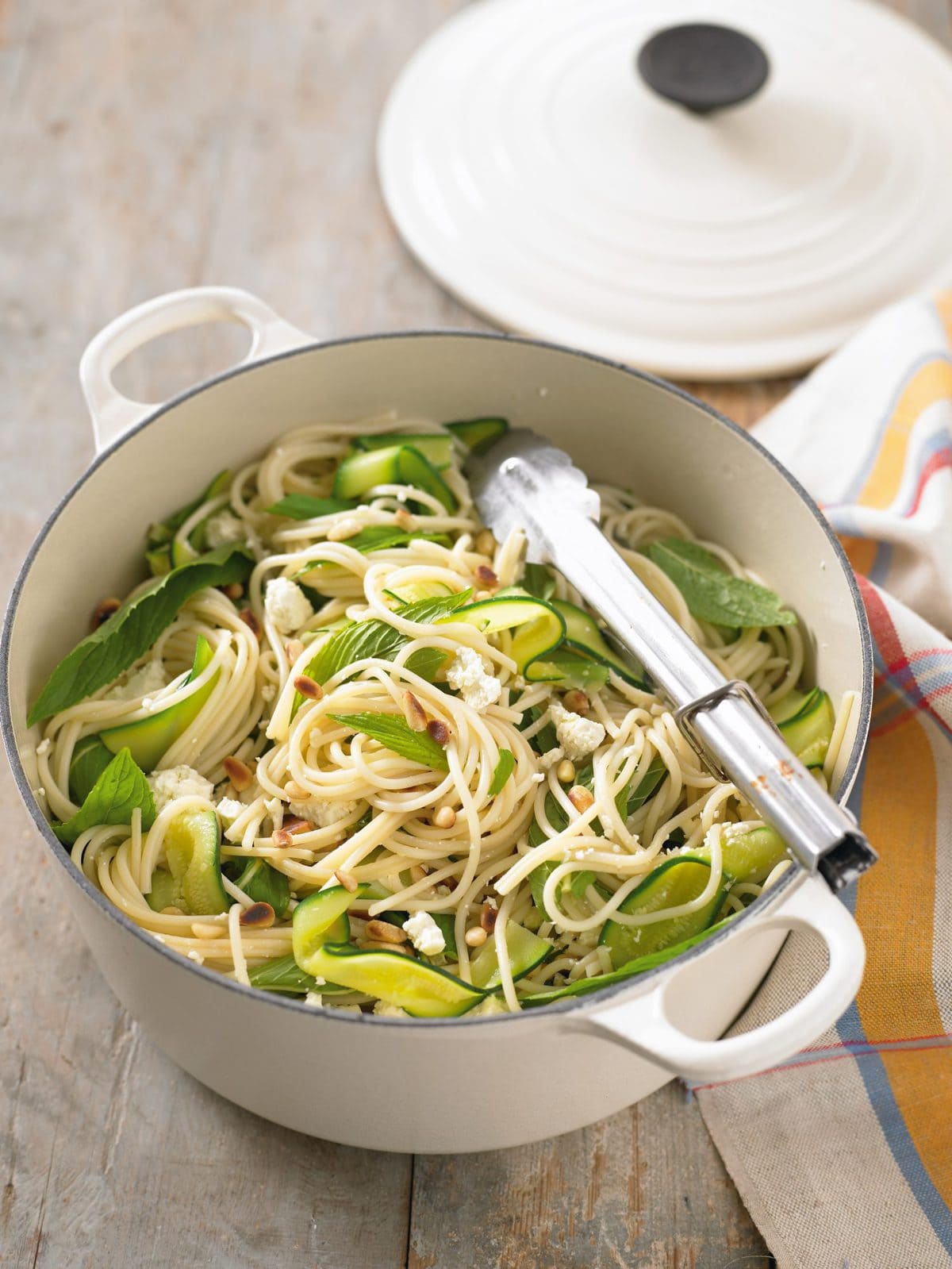 Spaghetti with courgettes, feta, mint and pine nuts