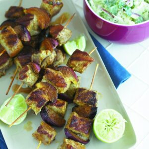 Spicy pork skewers with apple coleslaw