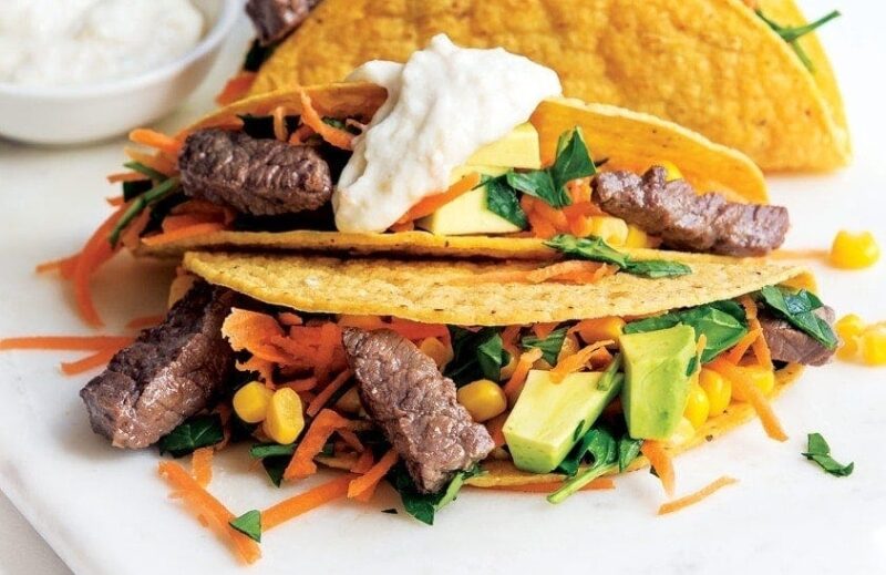 Steak tacos with avocado corn salsa and horseradish drizzle