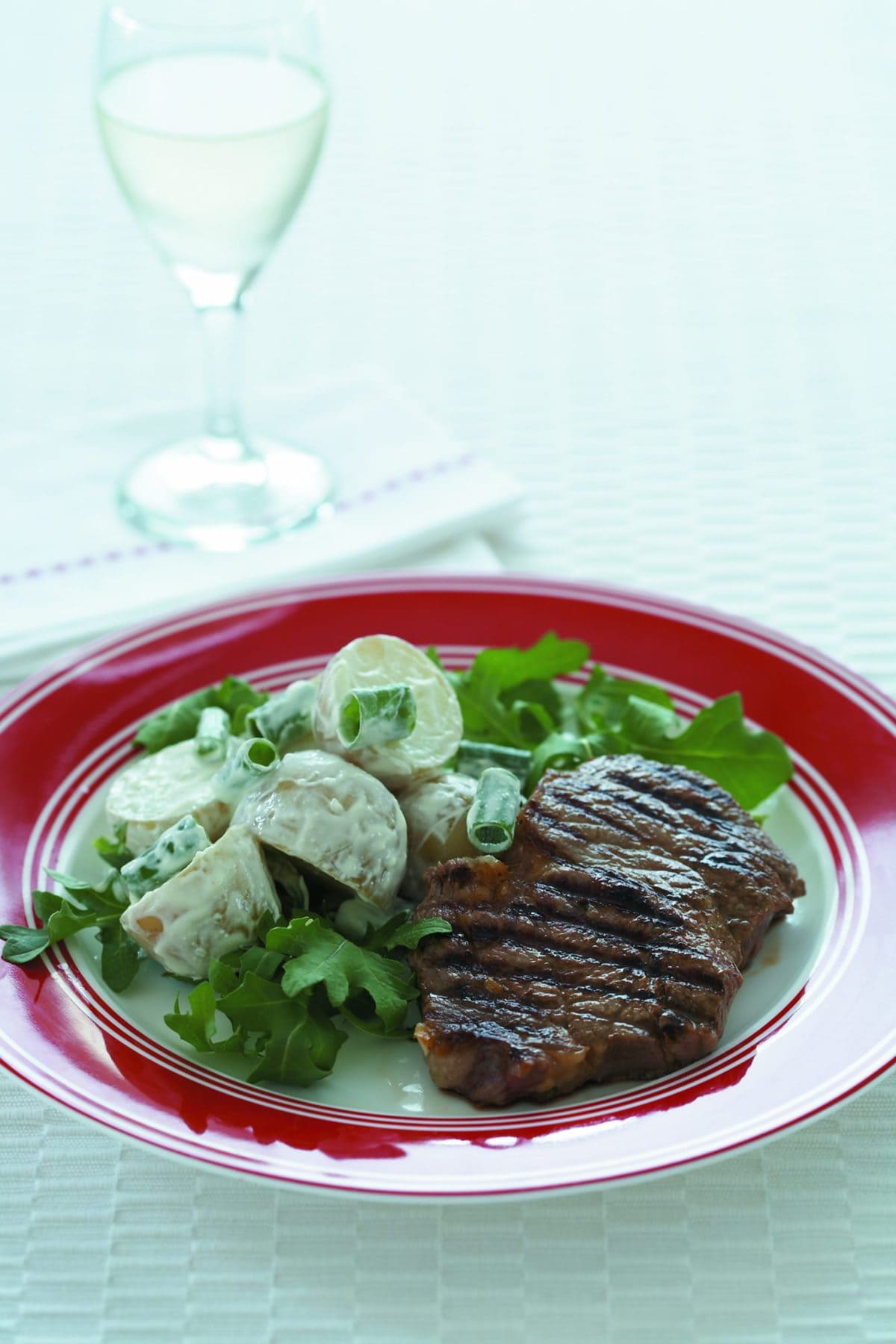 Steak Diane with potato salad