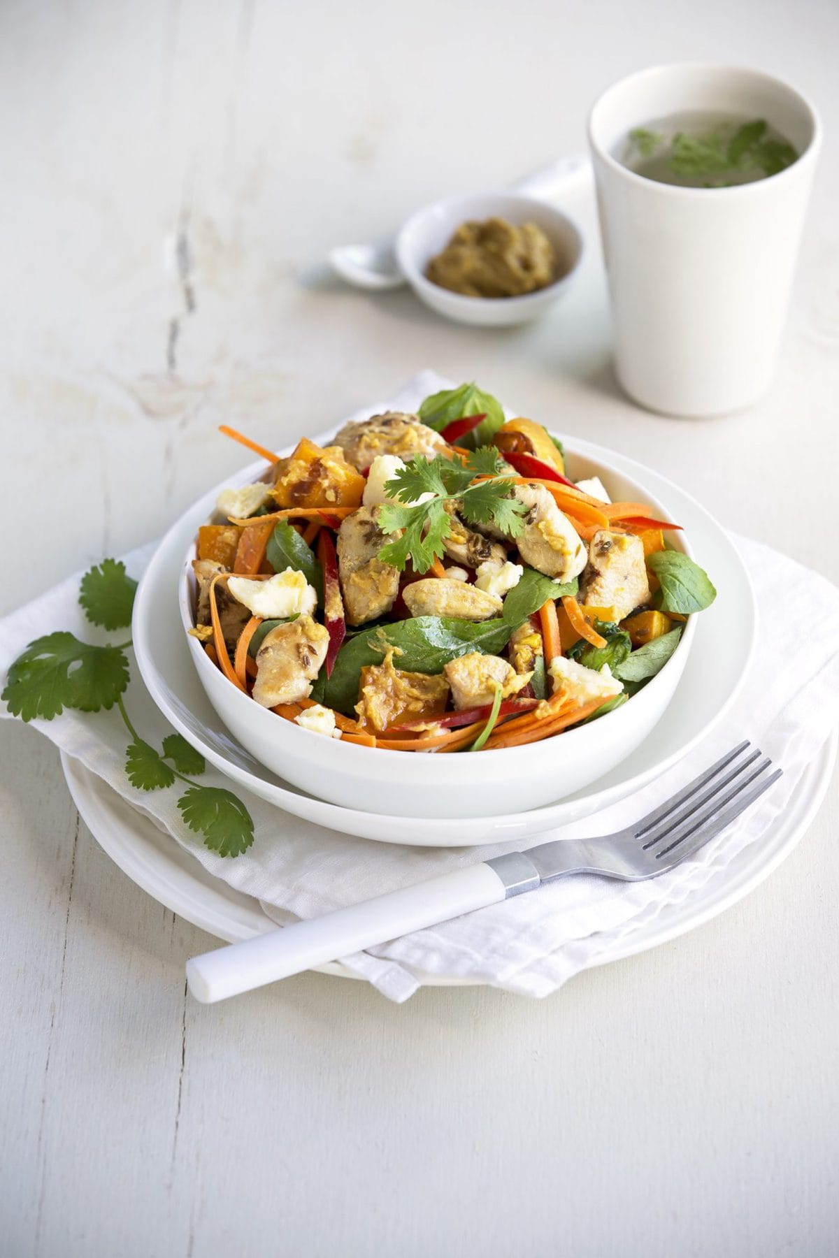 Warm chicken, pumpkin and feta salad with hummus