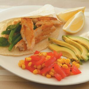 White and green bean tortillas with crispy fish and corn and tomato salsa