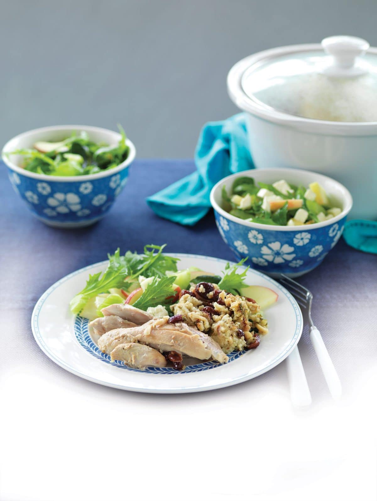 Whole slow-cooked chicken stuffed with cranberry and almond couscous