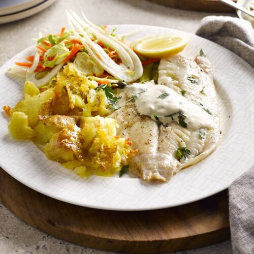 Fish with homemade tartare sauce, fennel slaw and crispy crushed potatoes
