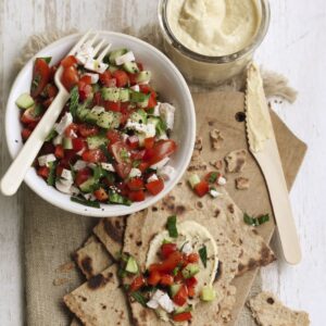 Chicken, tomato and cucumber salad with hummus