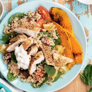 Dukkah chicken with warm couscous salad and tzatziki