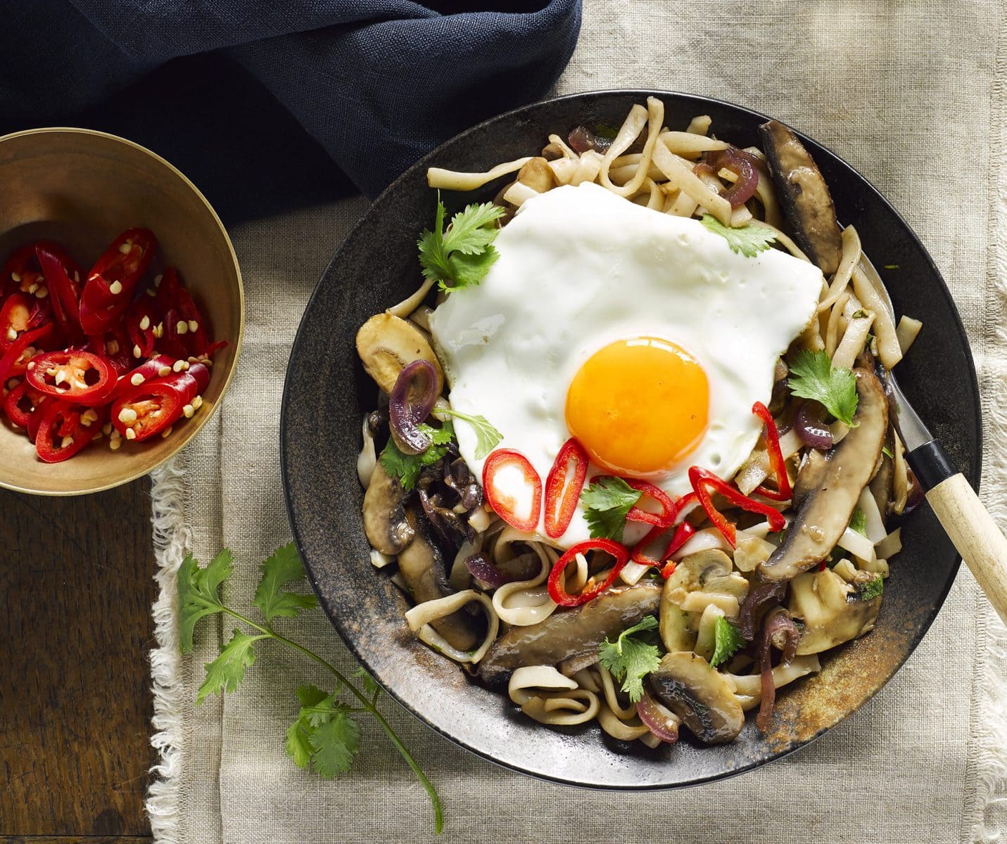Mushroom noodle stir-fry with fried egg