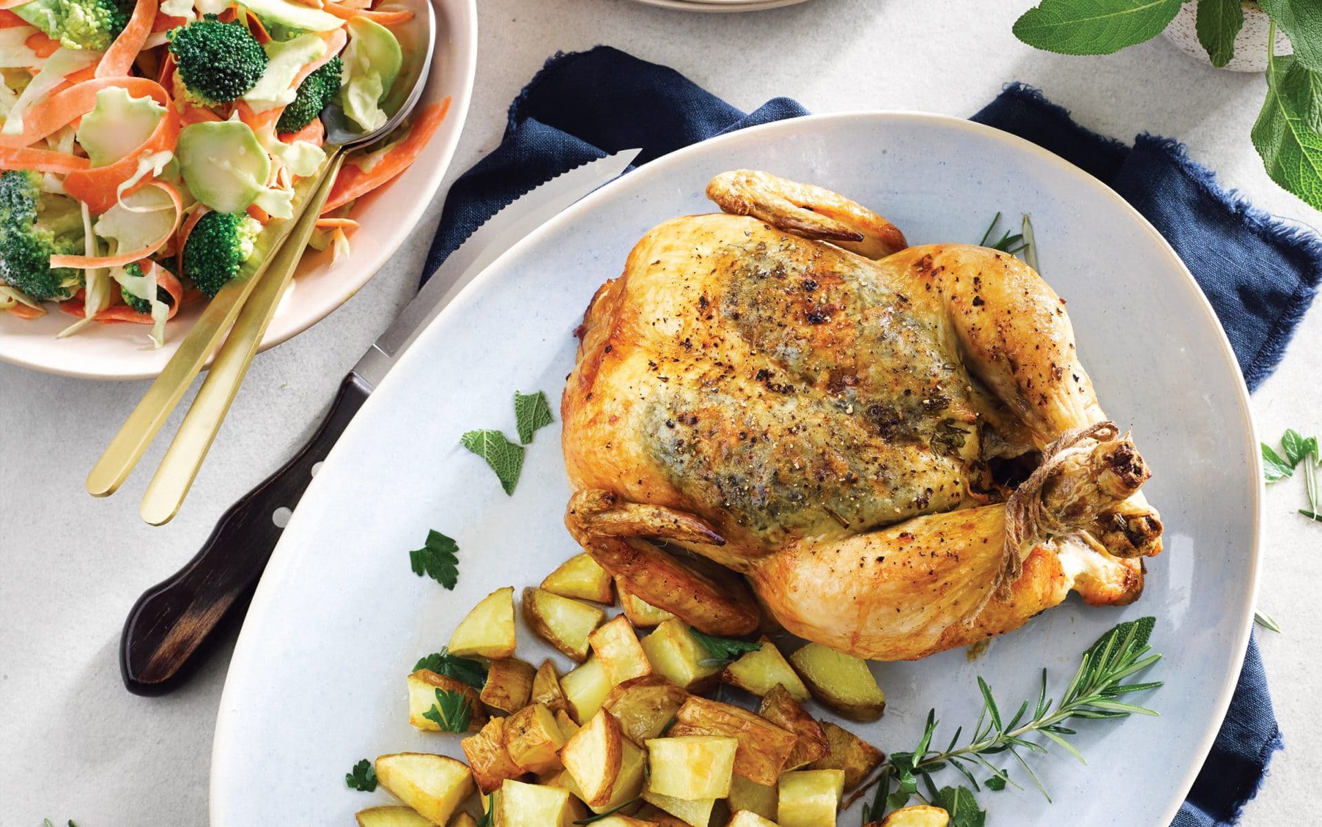 Roast herb chicken and potatoes with tangy kohlrabi slaw