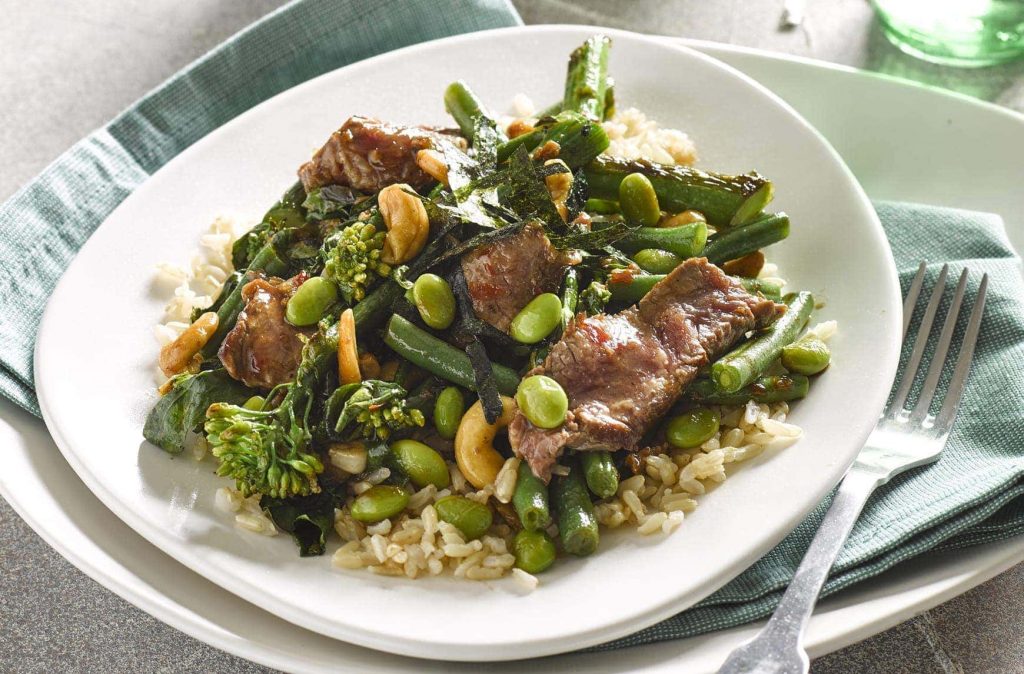 Chilli beef with cashews and greens