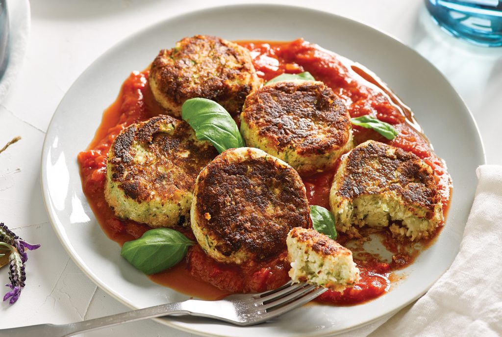 lentil patties on a red plate