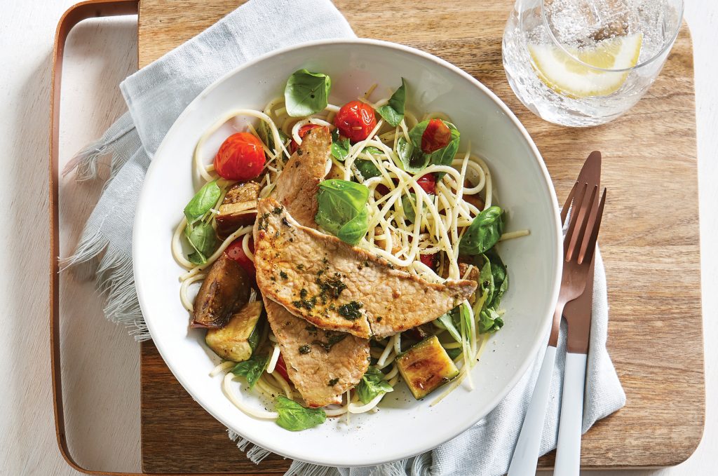 Pork schnitzel with roasted tomato pasta