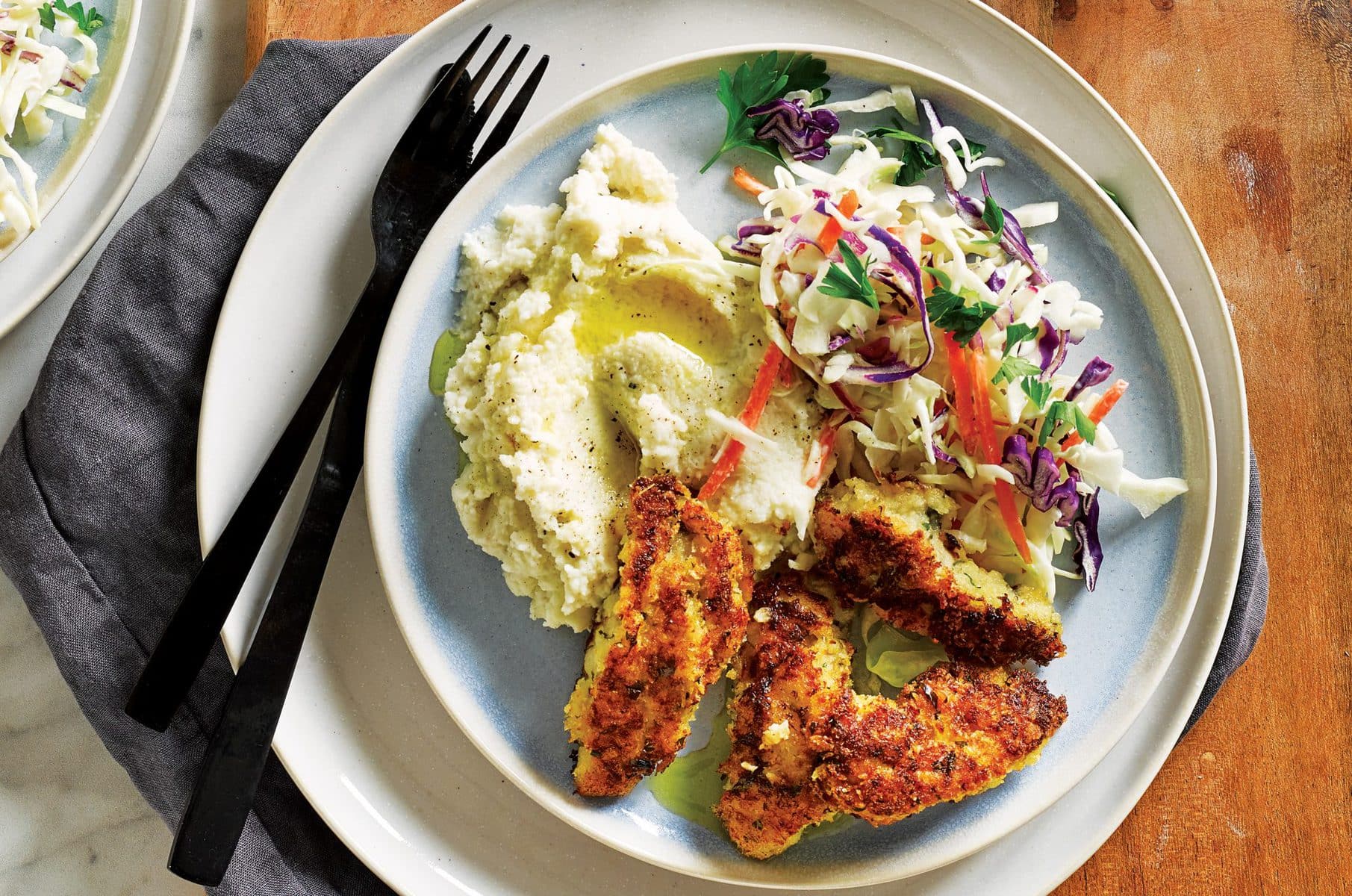 Crumbed chicken with coleslaw and cauliflower mash