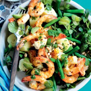 Prawns with green olives, lemon, pine nuts and watercress