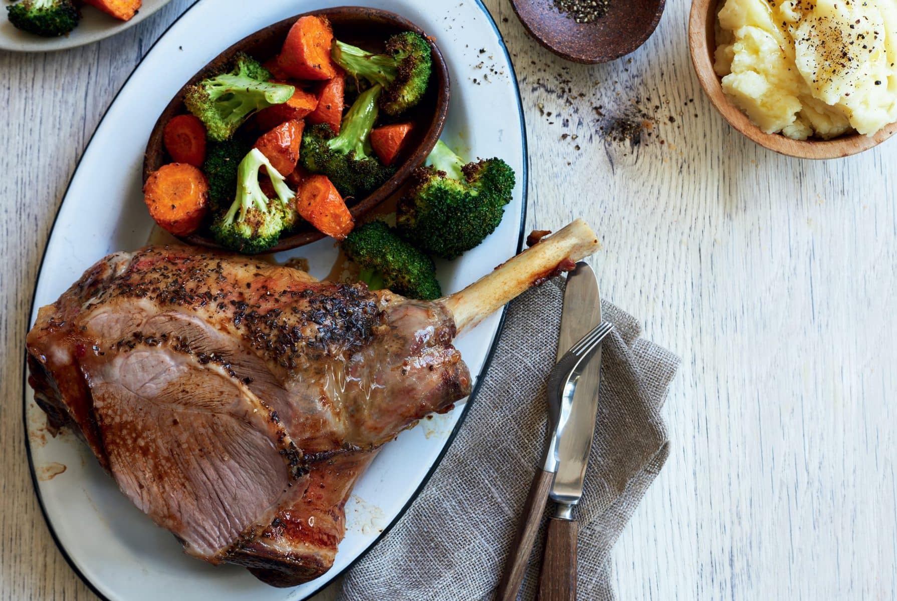 Roast lamb dinner with skordalia