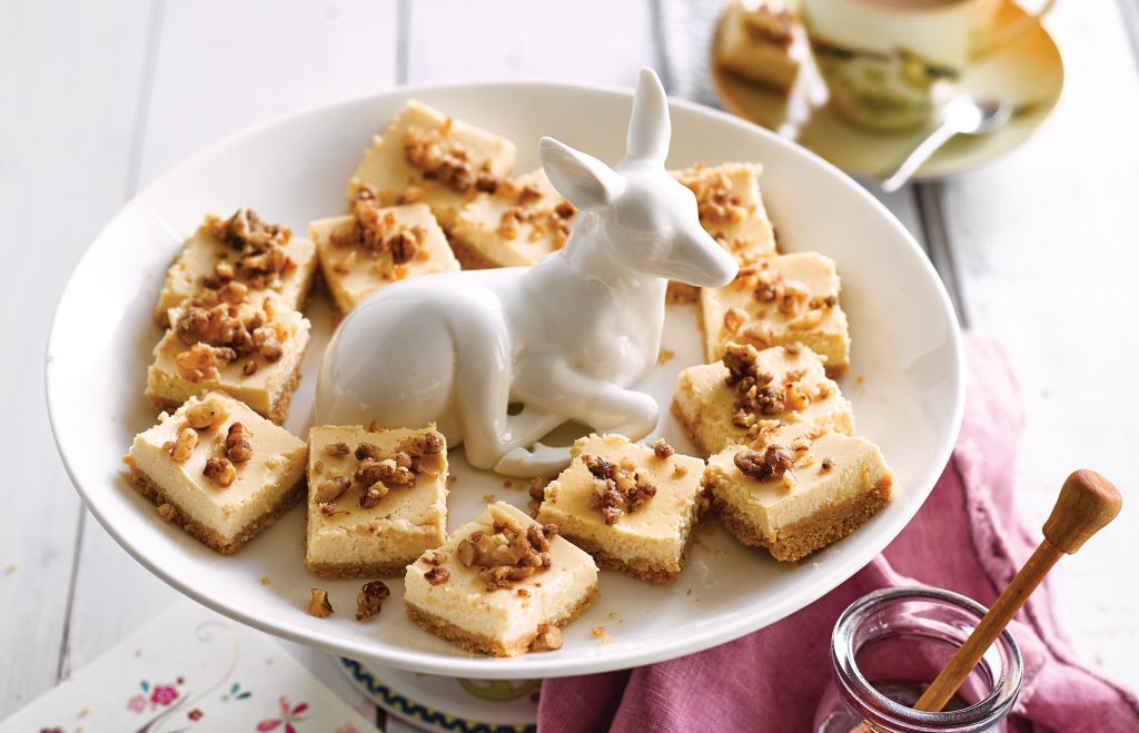 Baked honey cheesecake bites with toasted walnut crumb Baked honey cheesecake bites with toasted walnut crumb