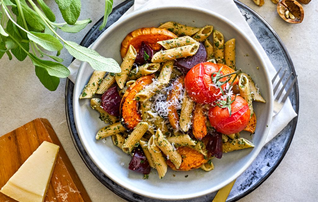 Pasta with walnut-sage pesto and roast vegetables