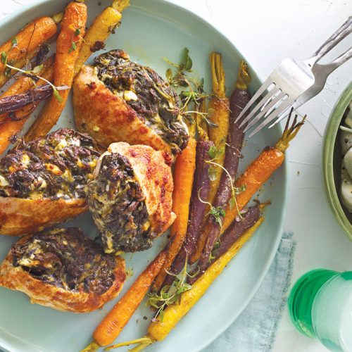 Stuffed chicken breast with baby carrots and creamy potato salad