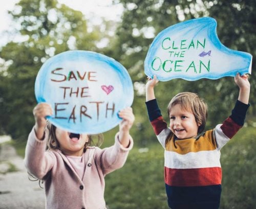 Children with climate change signs