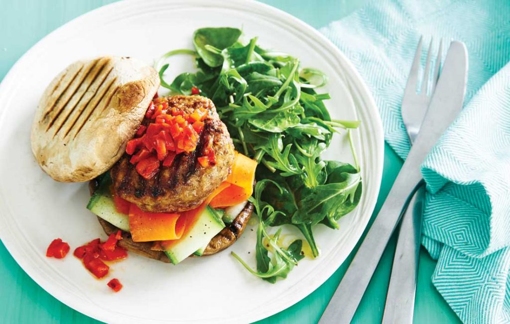 Turkey burgers with mushroom buns and capsicum salsa