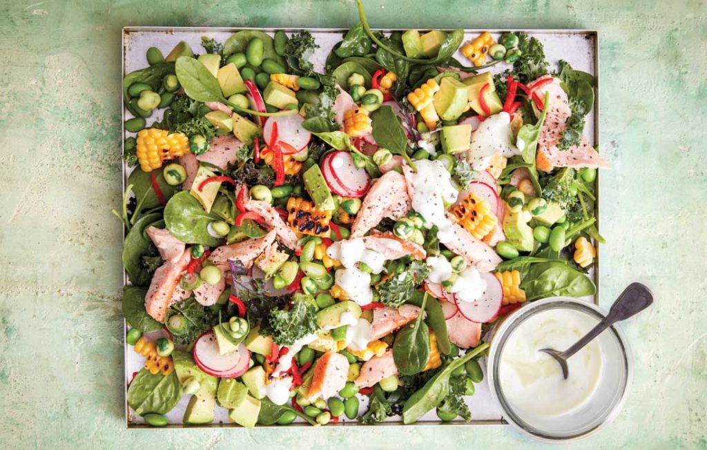 Hot smoked salmon salad with wasabi dressing
