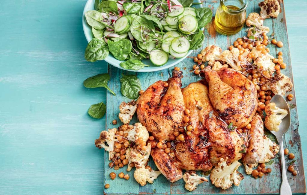 Harissa-spiced chicken with roasted cauliflower and chickpeas