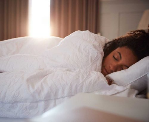 woman sleeping in bed